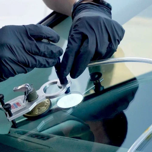 man repairing the windscreen