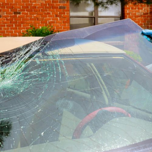 workers replacing the windscreen